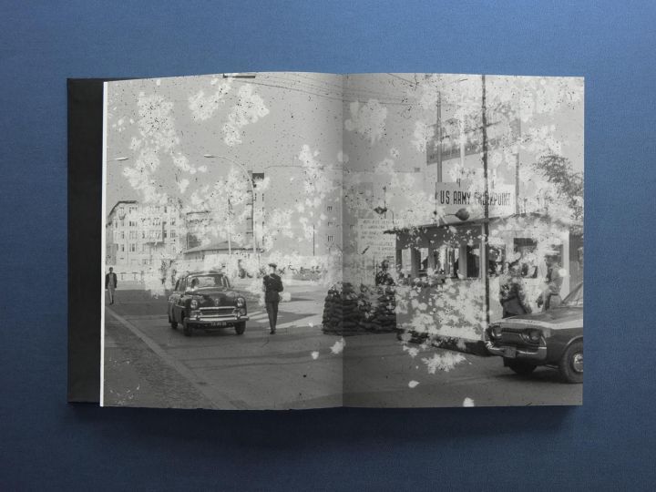 A recovered photo of Checkpoint Charlie in West Berlin from 1962