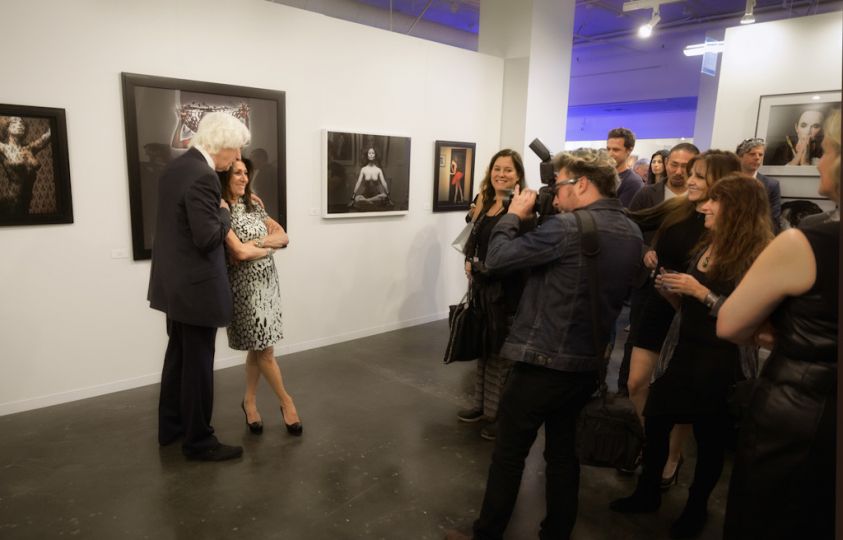 Doug and Francoise face the photographers together. © Andy Romanoff