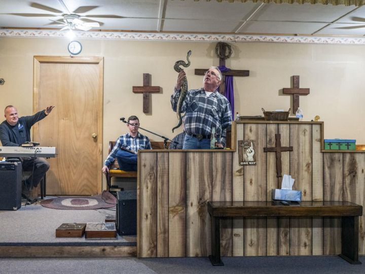 © Carl De Keyzer - MAGNUM Caption/Description: The Rock House Holiness Church. Snake handlers church. Mass on Friday evening. Town/City: Section Country/Region: USA Date Created: 22 Mar 2019